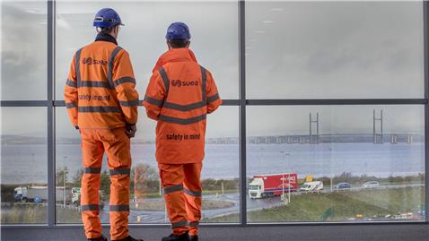 SUEZ employees looking over the River Severn