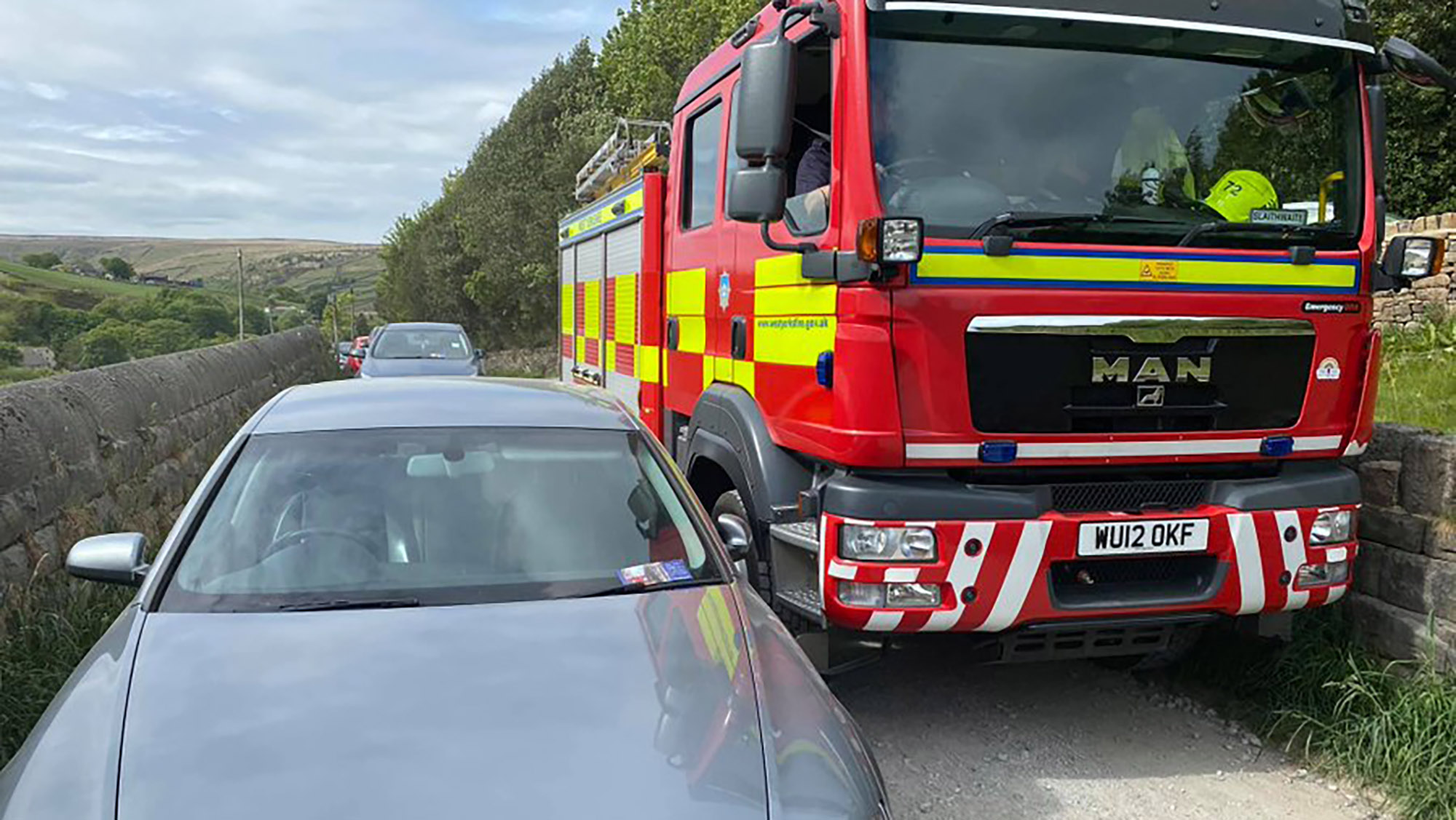 Calderdale irresponsible parking with Fire Engine